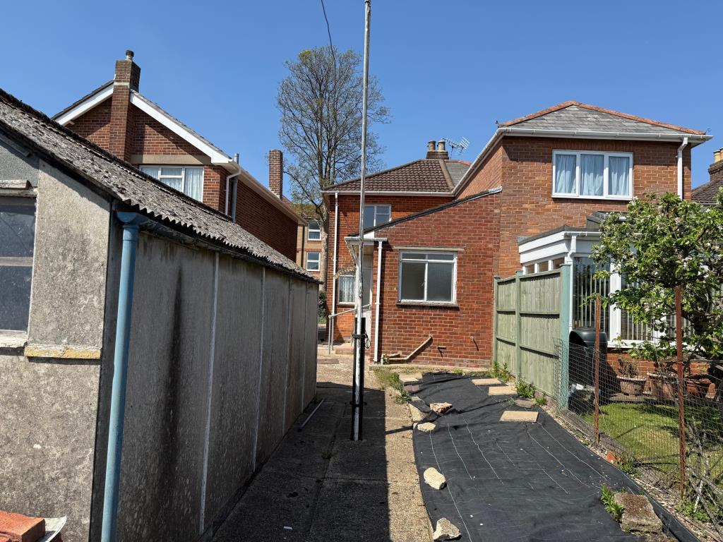 Lot: 146 - HOUSE FOR IMPROVEMENT - Rear view of the house taken from back garden
